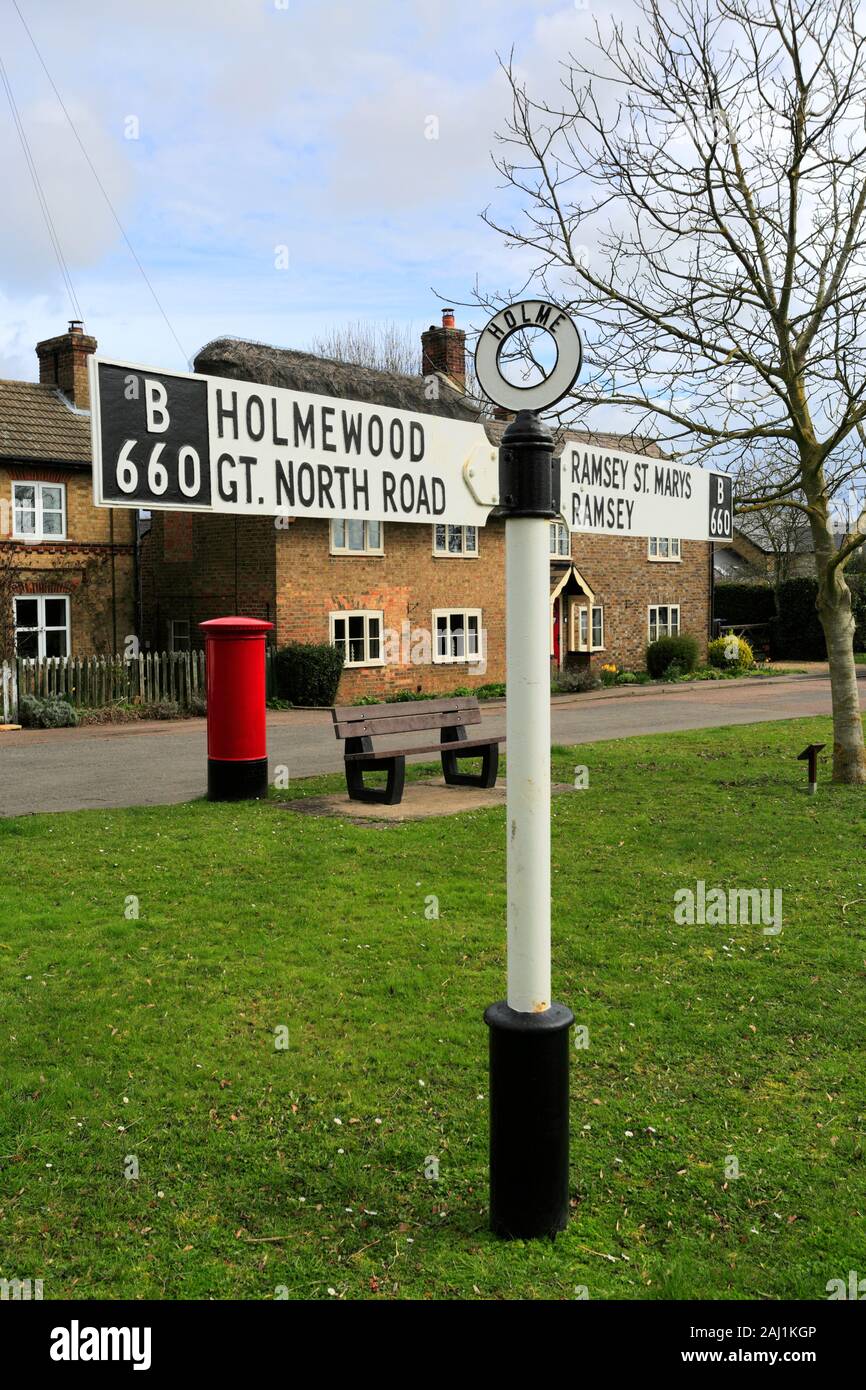 Road sign, Holme village sign, Cambridgeshire, England UK Stock Photo