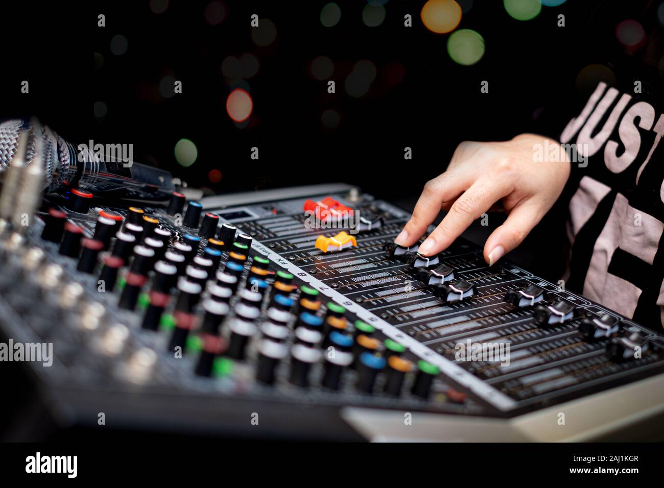 Woman hands mixing audio by sound mixer analog in the recording studio Stock Photo Alamy
