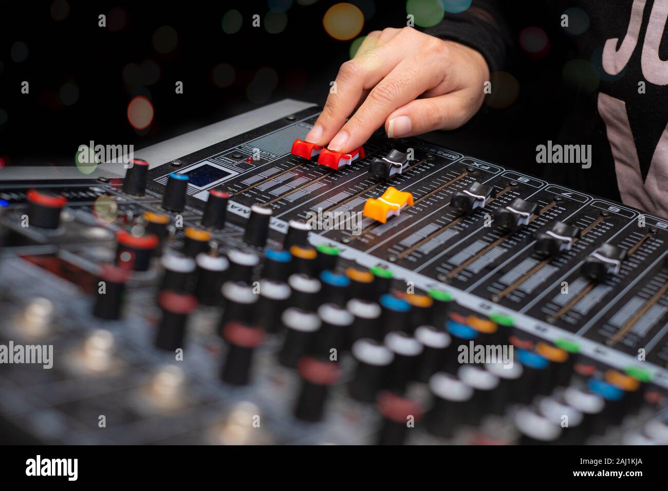 Woman hands mixing audio by sound mixer analog in the recording studio Stock Photo Alamy