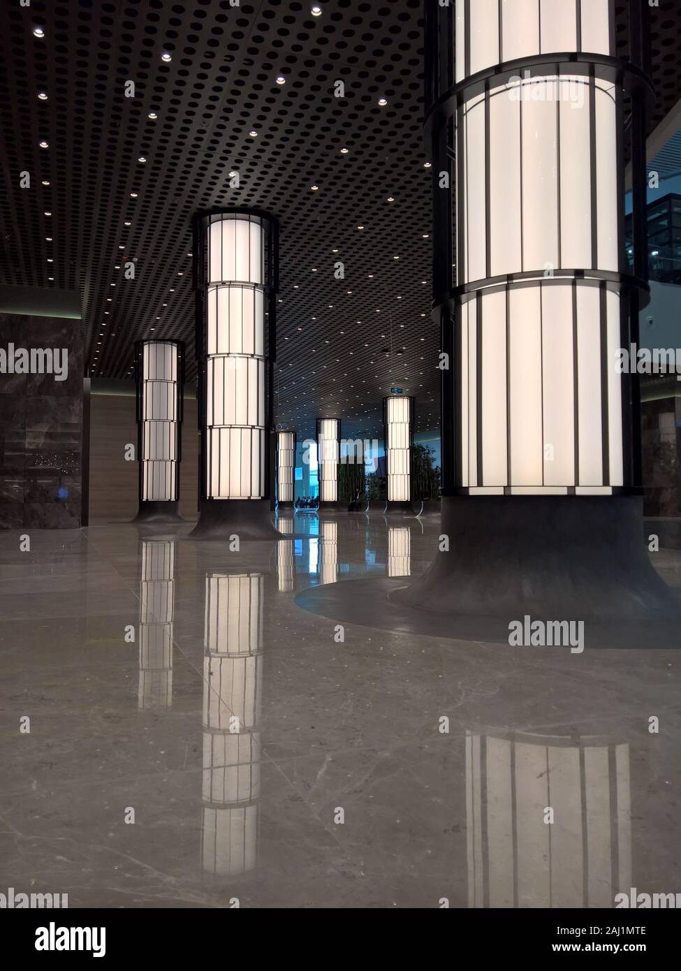 Modern architecture hallway with light up posts Stock Photo - Alamy