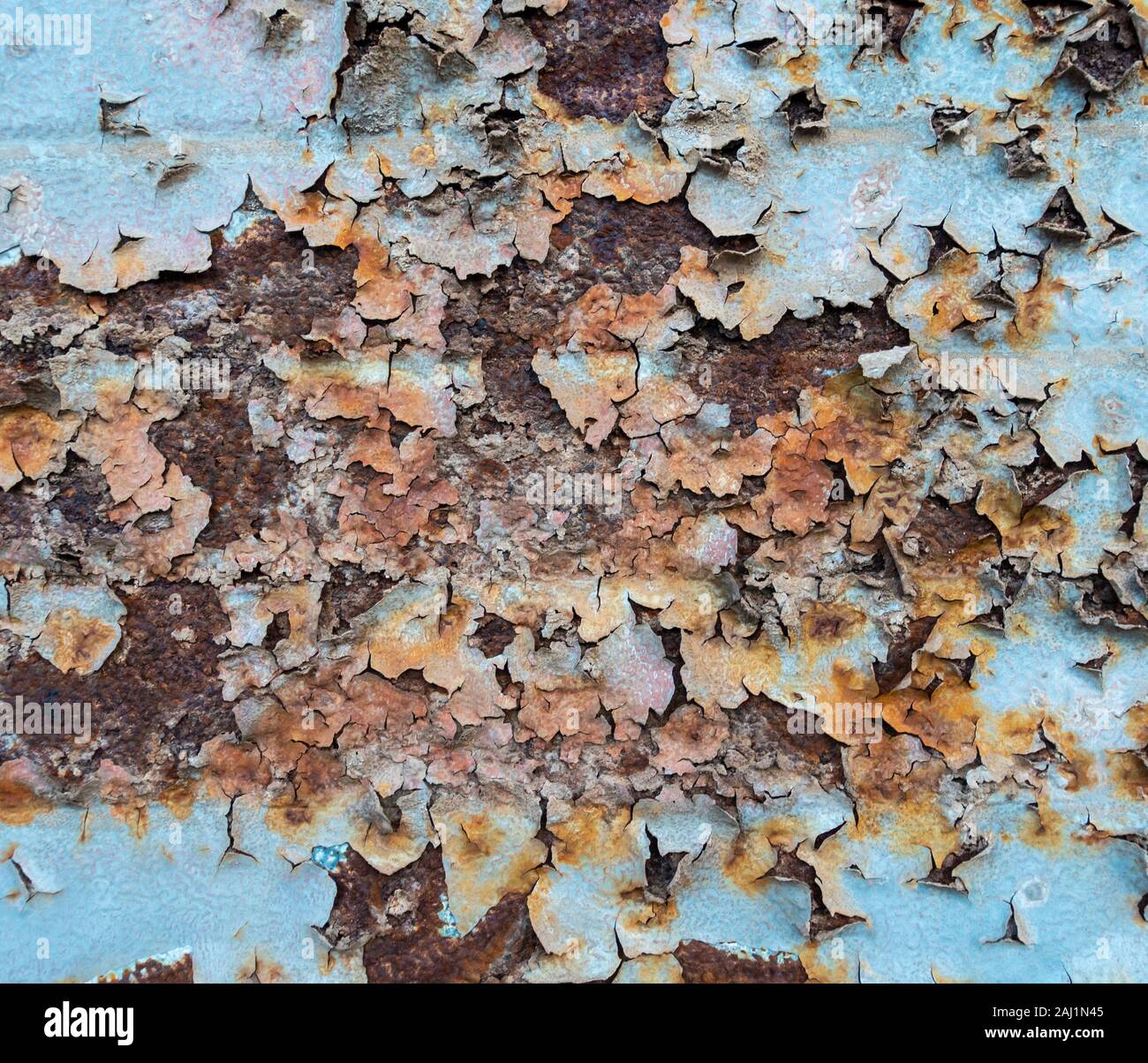 Peeling Paint On Rusty Garage Door Close To The Sea Stock Photo