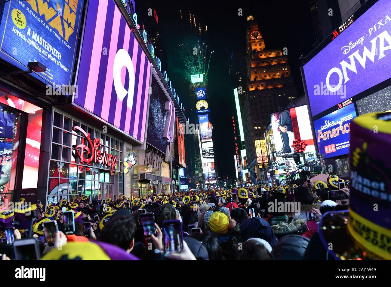 New Years Eve revelers are seen during the Times Square New Year's Eve 2020 Celebration on December 31, 2019 in New York City. Stock Photo