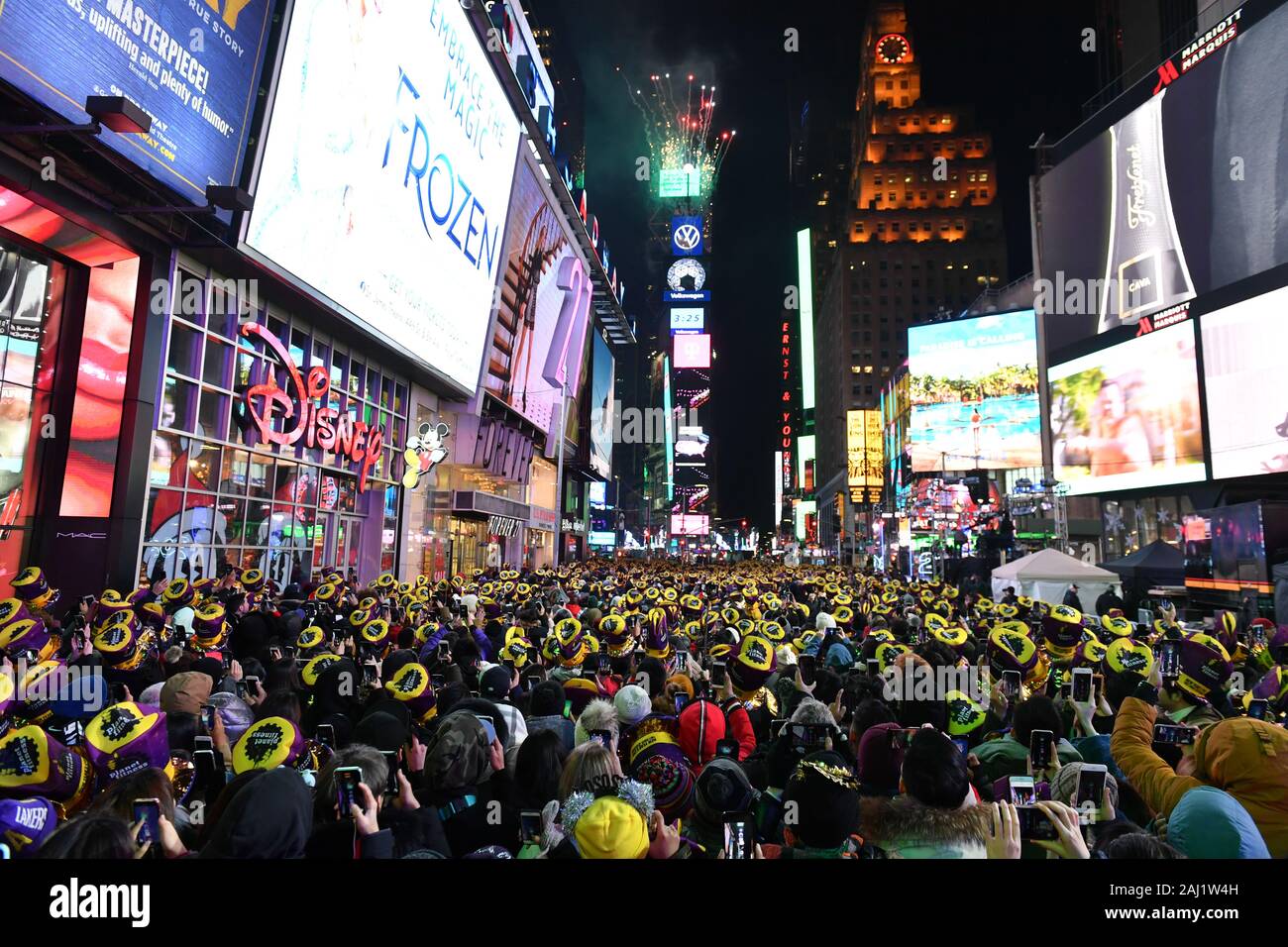 New Years Eve revelers are seen during the Times Square New Year's Eve 2020 Celebration on December 31, 2019 in New York City. Stock Photo