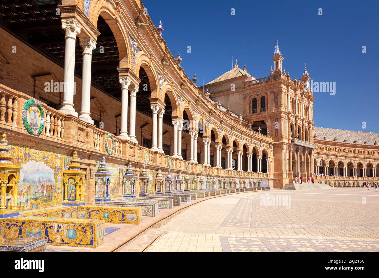 Plaza de Espana with ceramic tiled alcoves and arches, Maria Luisa Park, Seville, Andalusia, Spain, Europe Stock Photo