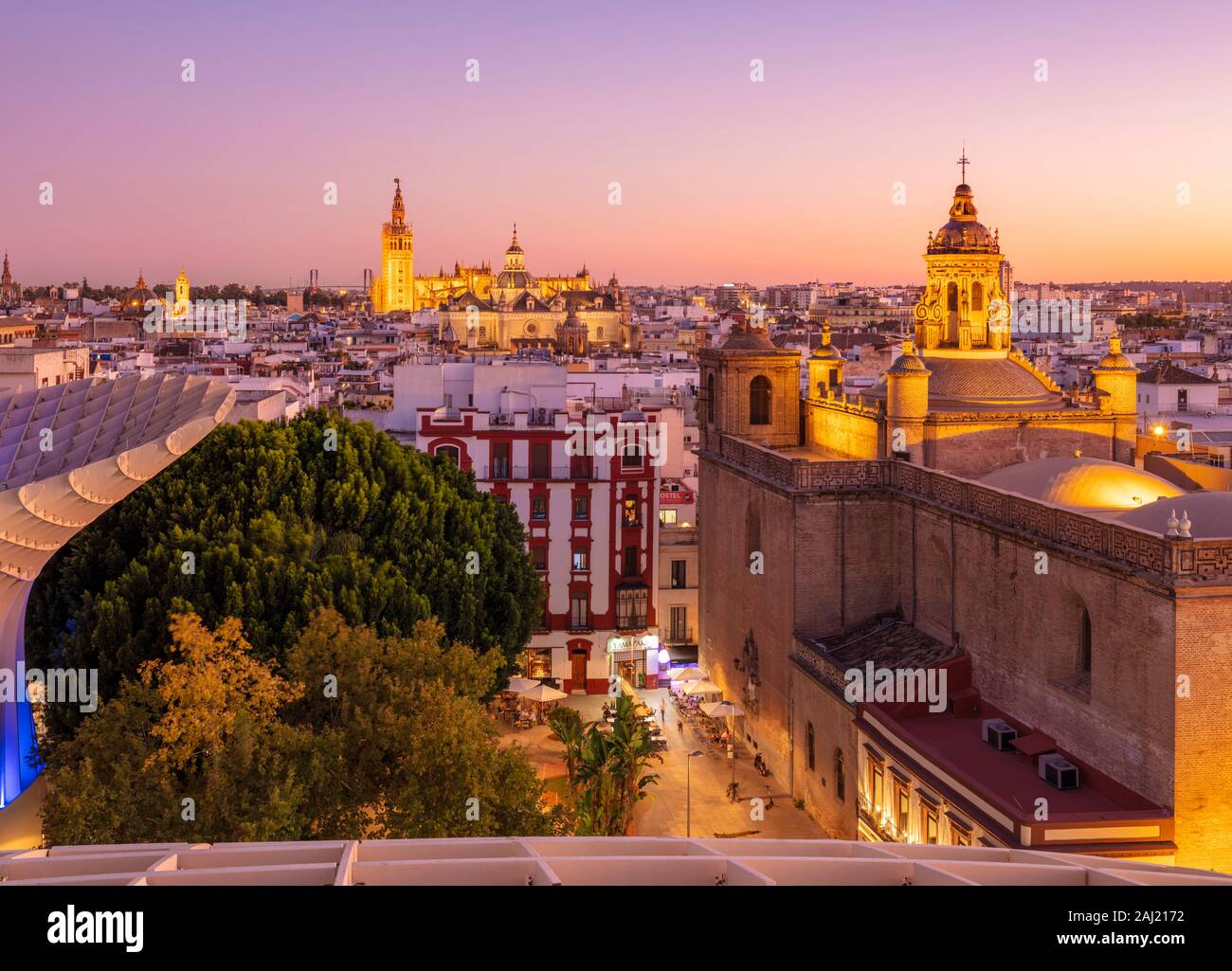 Sunset Seville skyline of Cathedral and city rooftops from the Metropol Parasol, Seville, Andalusia, Spain, Europe Stock Photo