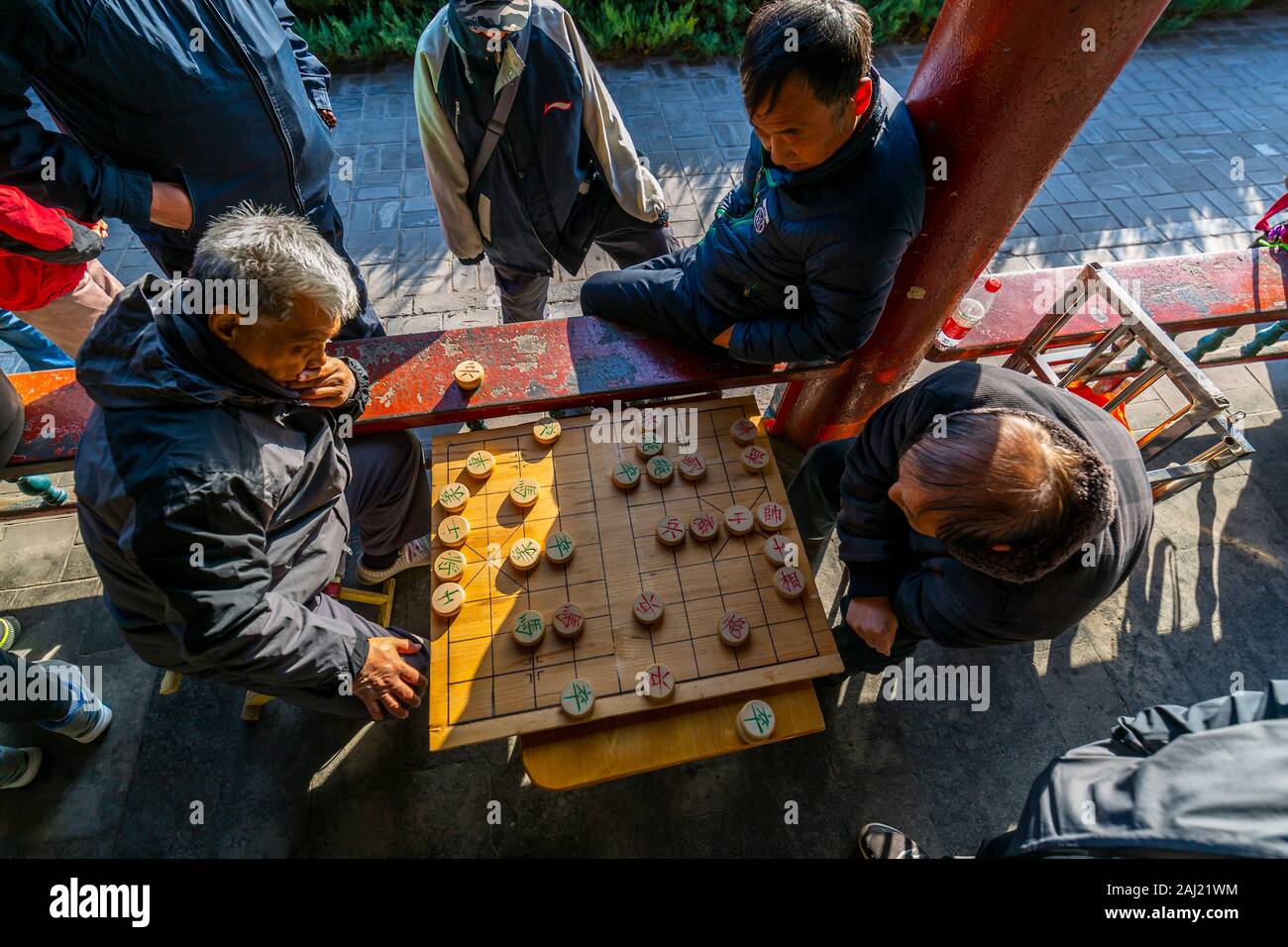 Locals playing board game in Gathering at the Ghost Corridor in the Temple of Heaven, Beijing, People's Republic of China, Asia Stock Photo