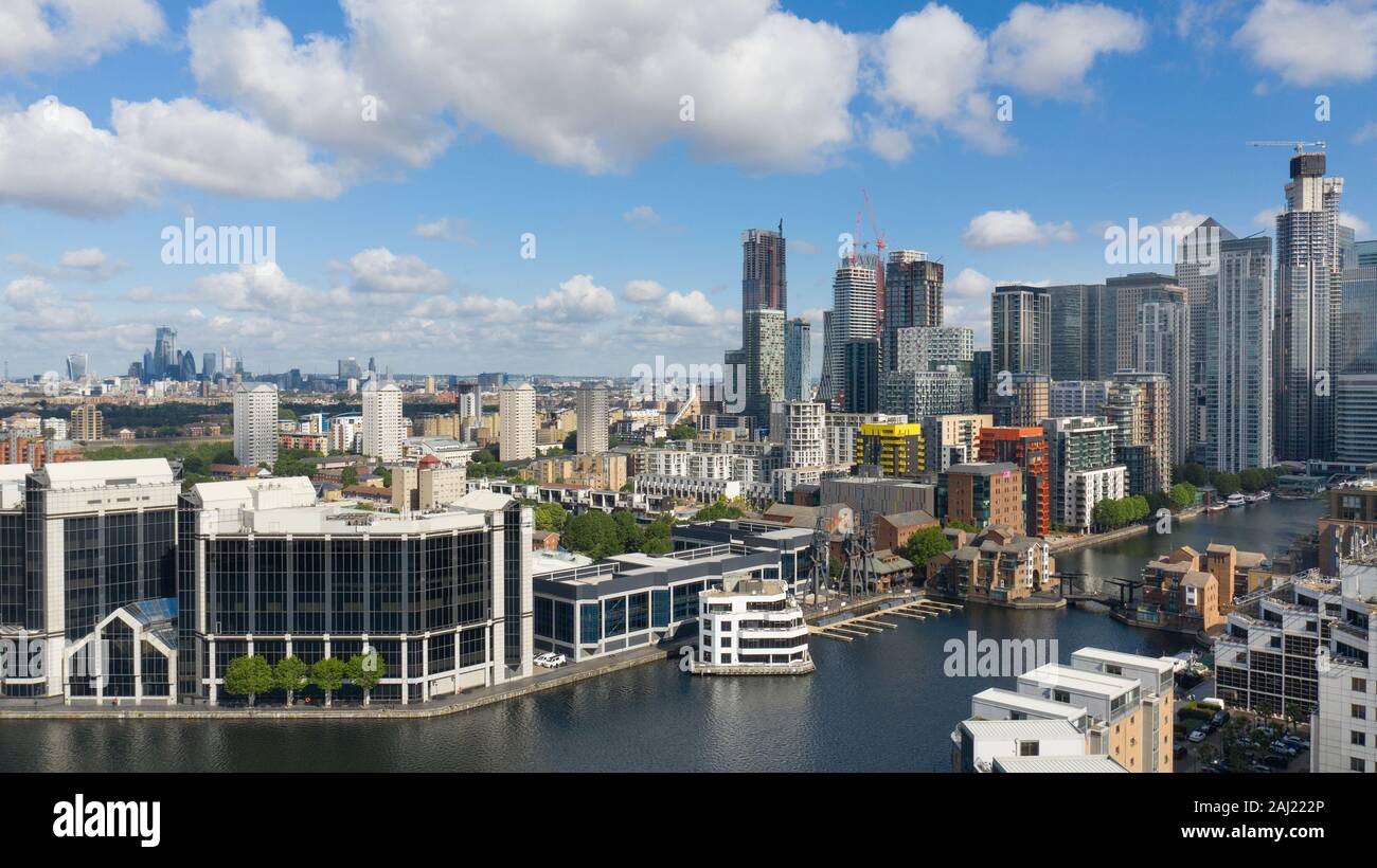 London Real Estate in Docklands, Canary Wharf. Drone Aerial View of Beautiful Modern Architecture with Finance Centers in the United Kingdom Capital Stock Photo