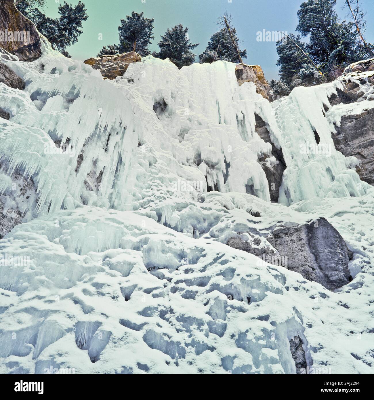 frozen cataract falls in the elk creek basin near augusta, montana Stock Photo