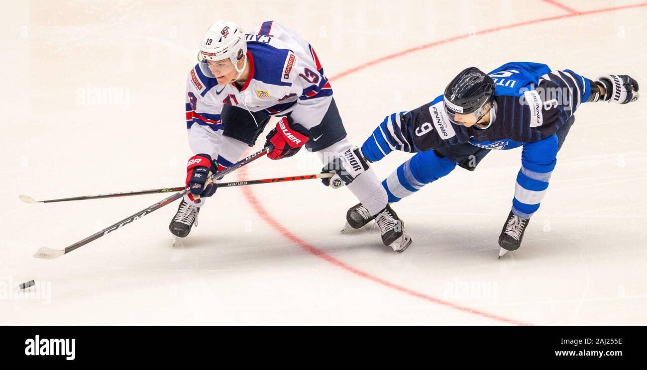 Trinec, Czech Republic. 02nd Jan, 2020. L-R Cole Caufield (USA) and Toni Utunen (FIN) in action during the 2020 IIHF World Junior Ice Hockey Championships quarterfinal match between USA and Finland in Trinec, Czech Republic, on January 2, 2020. Credit: Vladimir Prycek/CTK Photo/Alamy Live News Stock Photo