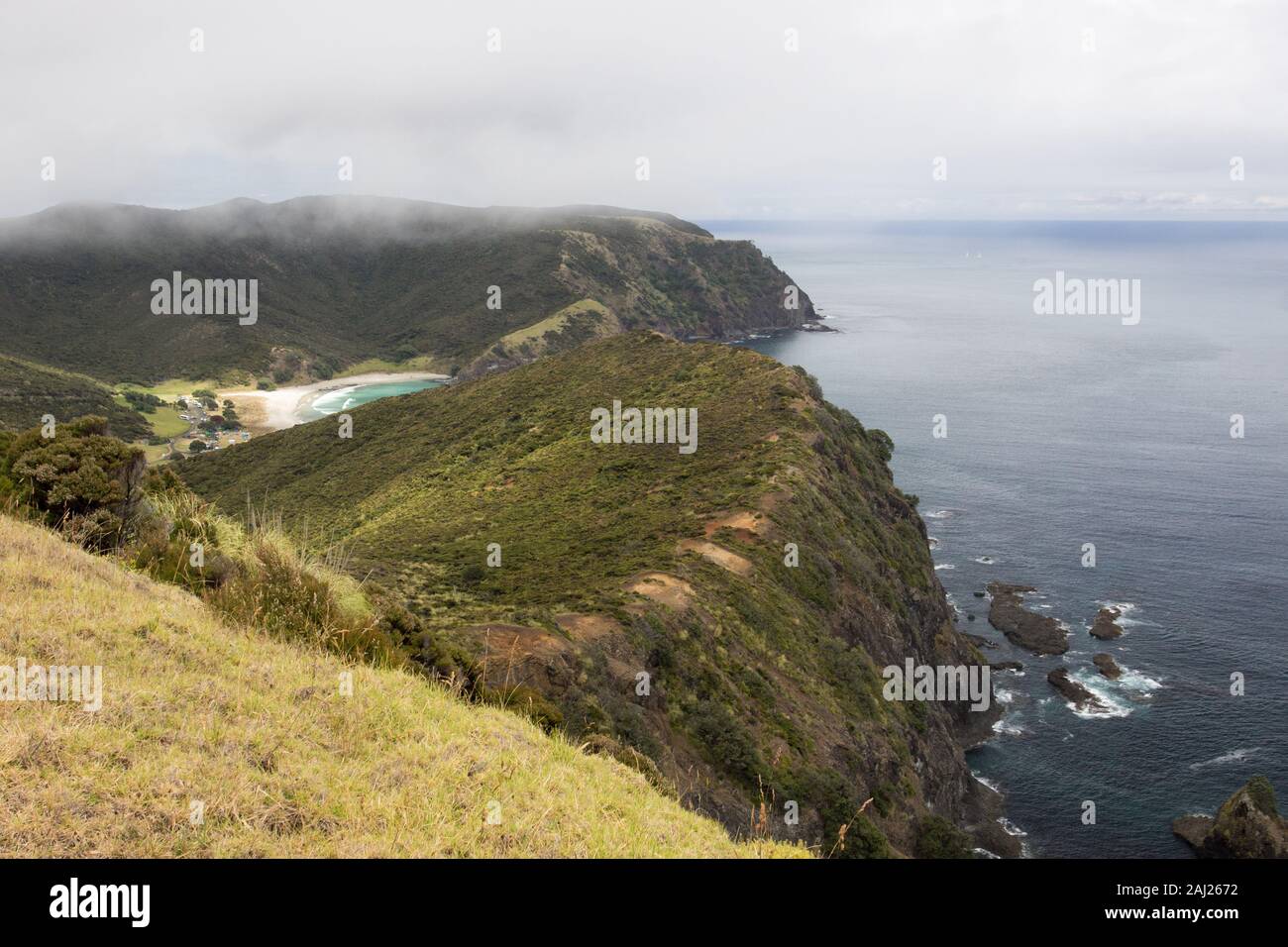 The Te Paki Coastal Track on the Cape Reinga in Northland, New Zealand, with Tapotupotu Bay beyond. Stock Photo