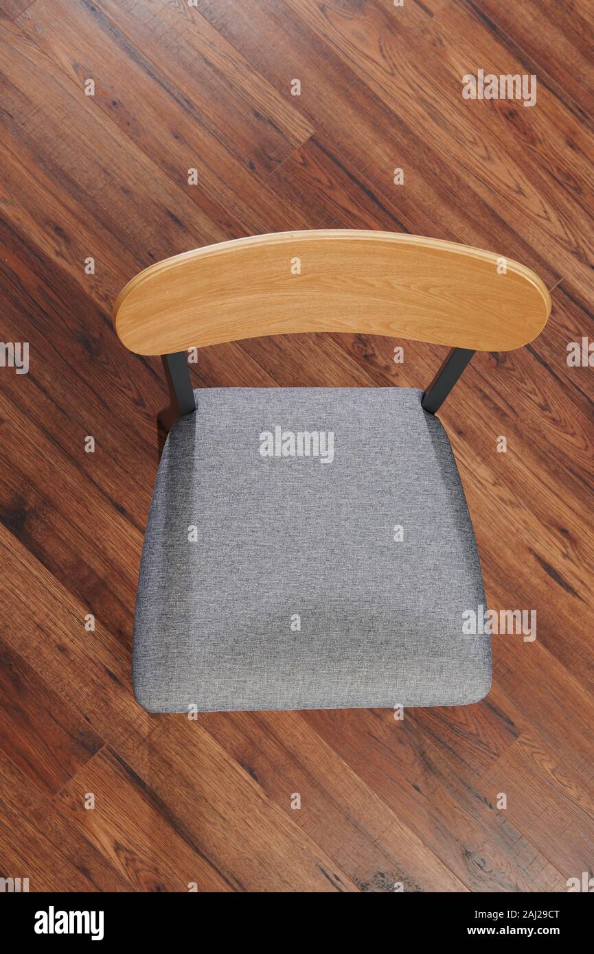 Gray cloth sit with wooden back chair above top view Stock Photo