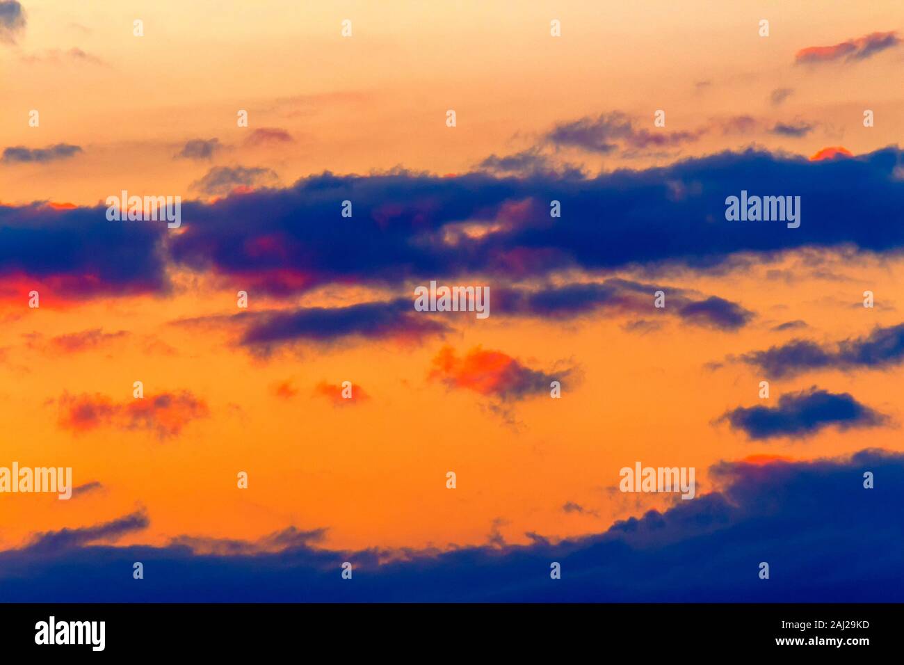 orange sunset sky with clouds. beautiful nature background Stock Photo ...