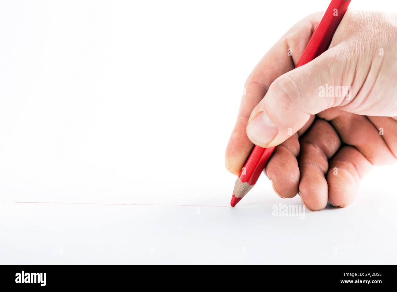 hand with the red pencil on a white background Stock Photo - Alamy