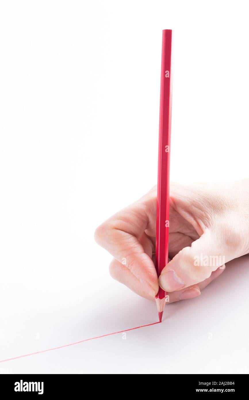 hand with the red pencil on a white background Stock Photo - Alamy