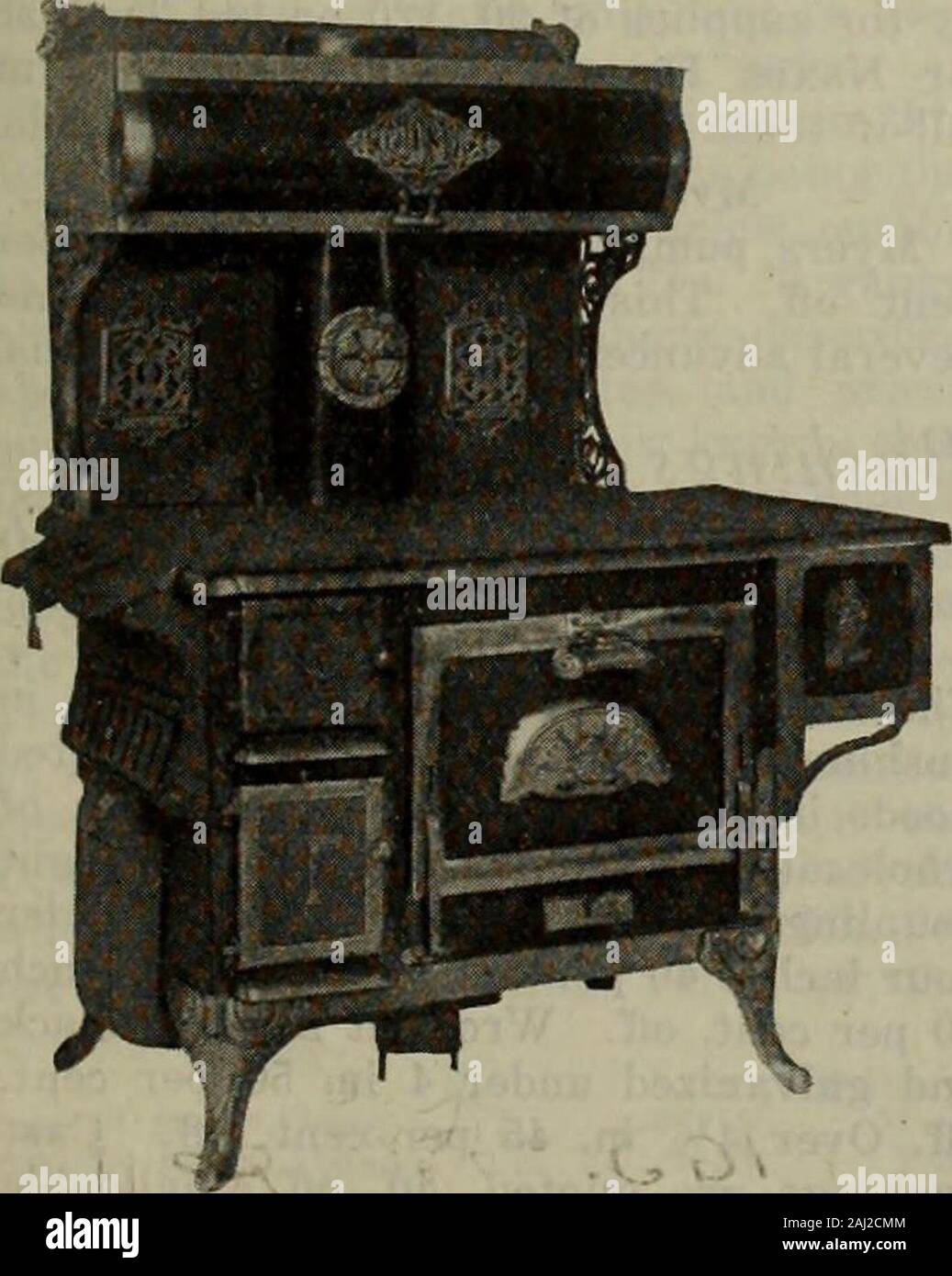 Hardware merchandising March-June 1917 . Rear of stove showing Economizer inplace. device can be attached at very smallcost to any stove or range without alter-ing the patterns to any great extent.The patentee describes the device as fol-lows:—A flue of sufficient size to giveperfect draft is of polished iron or steel,and runs at right angles under the stovewith an opening in the centre, or inde-pendently if so desired within 3 inchesof the floor, to admit air to draft andcheck flue. The air being super-heated. in its travels gives perfect combustionto the fire when open for draft. Whencheckin Stock Photo