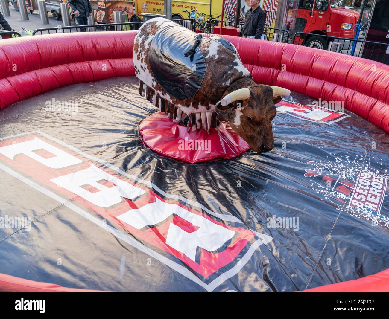 New York, United States. 02nd Jan, 2020. Staten Island Yankees mascot  Scooter the Holy Cow attends mechanical bull rides during Professional Bull  Riders launch of season 2020 outside of Madison Square Garden (