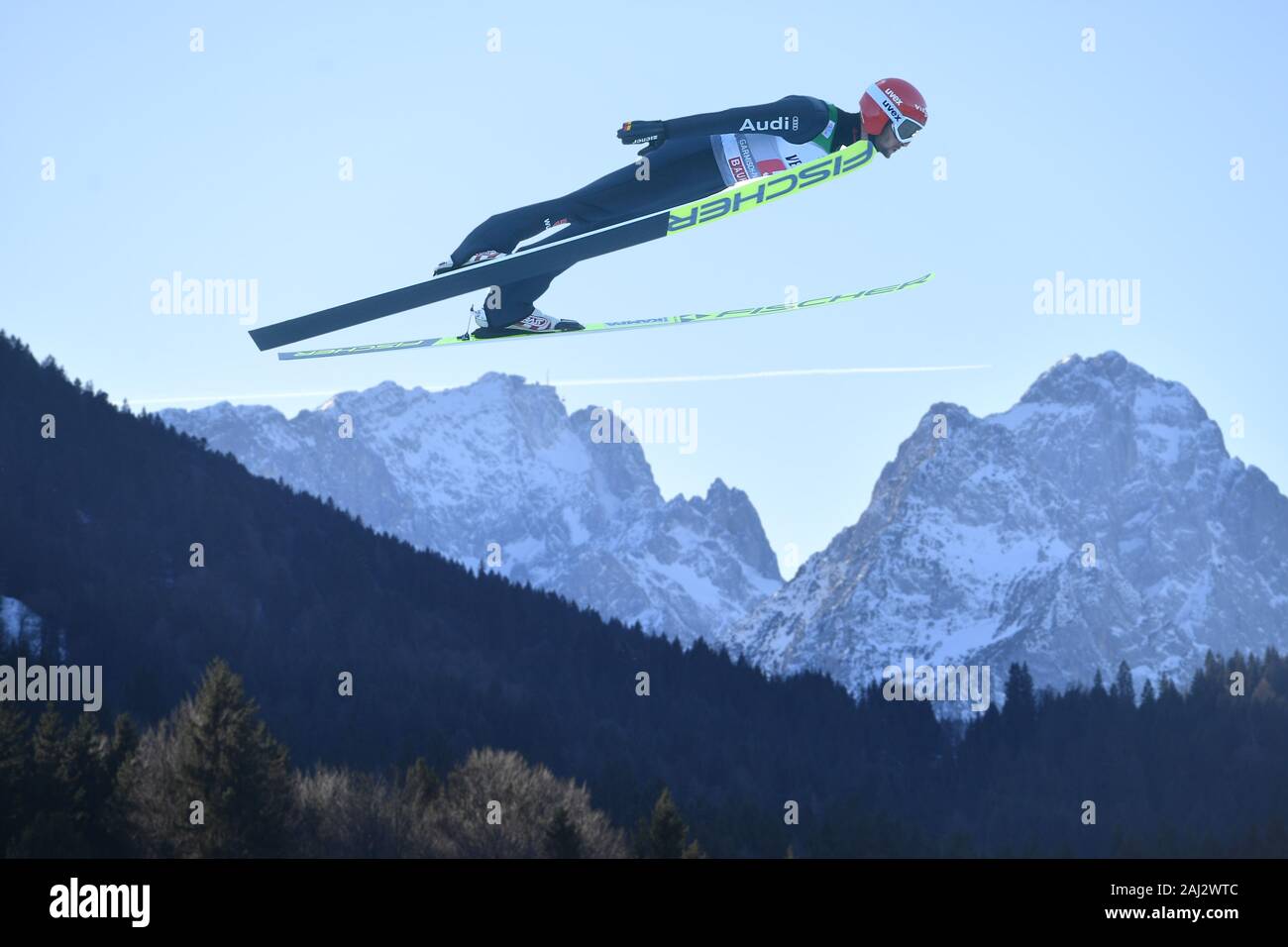 Markus Eisenbichler Ger Action Jump In Front Of An Alpine Panorama With Zugspitze And Wachsenstein Photomontage