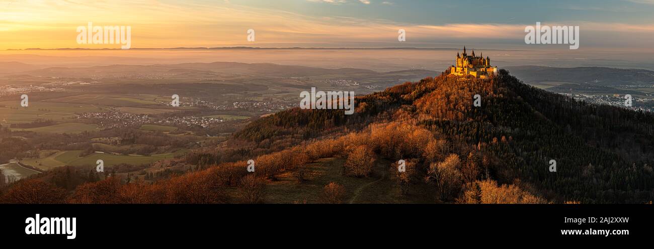 Castle Hohenzollern, home of eldest dynasty of kings and emperors in Europe at sunset. Next to Hechingen and Balingen in Baden-Württemberg, Germany. Stock Photo