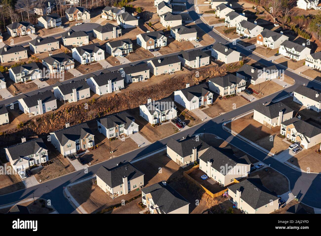 Aerial view new suburban homes, streets and cul-de-sacs near Atlanta, Georgia. Stock Photo