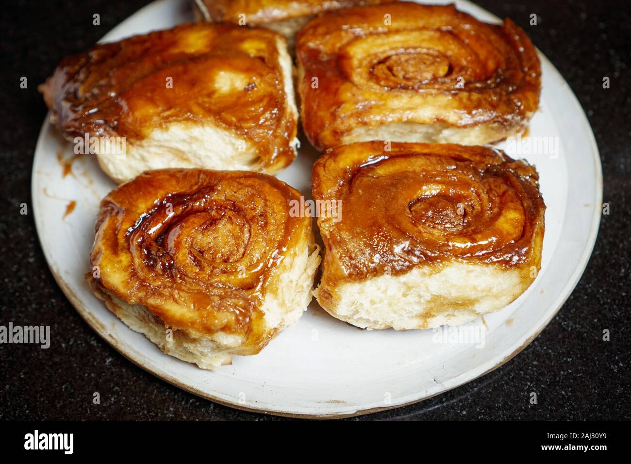 Homemade sticky buns on a plate Stock Photo