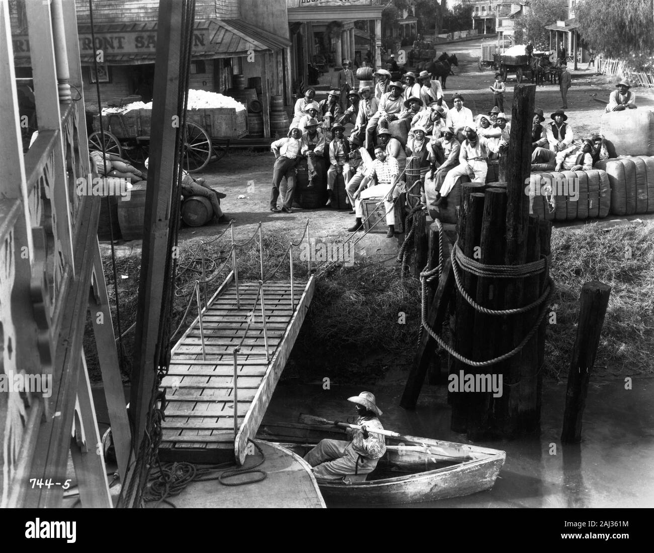 PAUL ROBESON singing Ol' Man River in SHOW BOAT 1936 director JAMES WHALE novel Edna Ferber music JEROME KERN lyrics OSCAR HAMMERSTEIN II Universal Pictures Stock Photo