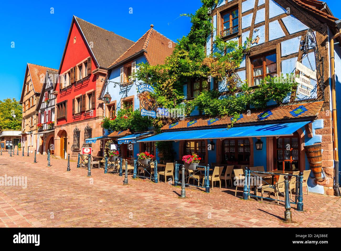 ALSACE WINE REGION, FRANCE - SEP 19, 2019: Typical restaurant in Kaysersberg village which is located on Alsatian Wine Route, France. Stock Photo