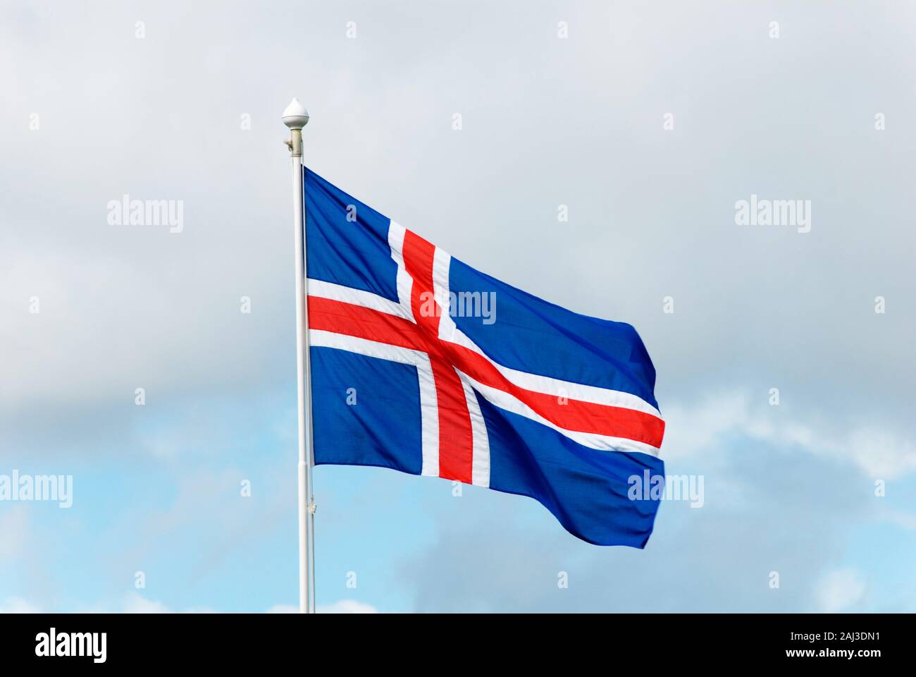 Europa, Island, Iceland, Fahne, Flagge, Nationalfahne, Fahnenmast, flattert im Wind, Stock Photo
