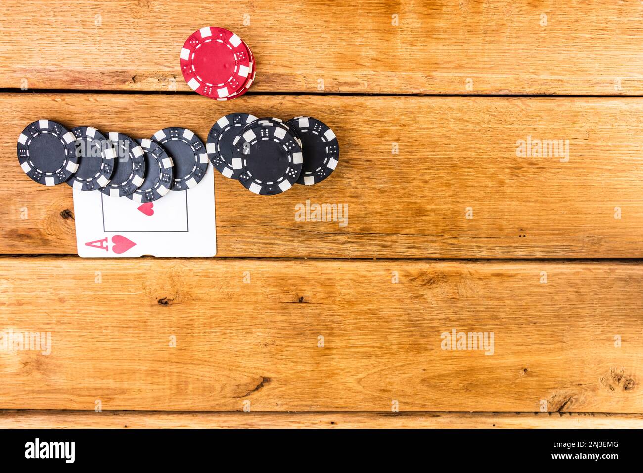 Stacks of poker chips on wooden background, poker chips spread, big