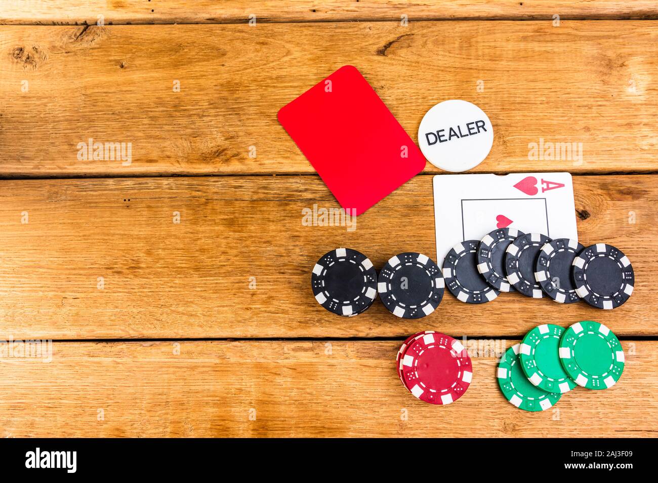 Stacks of poker chips on wooden background, poker chips spread, big