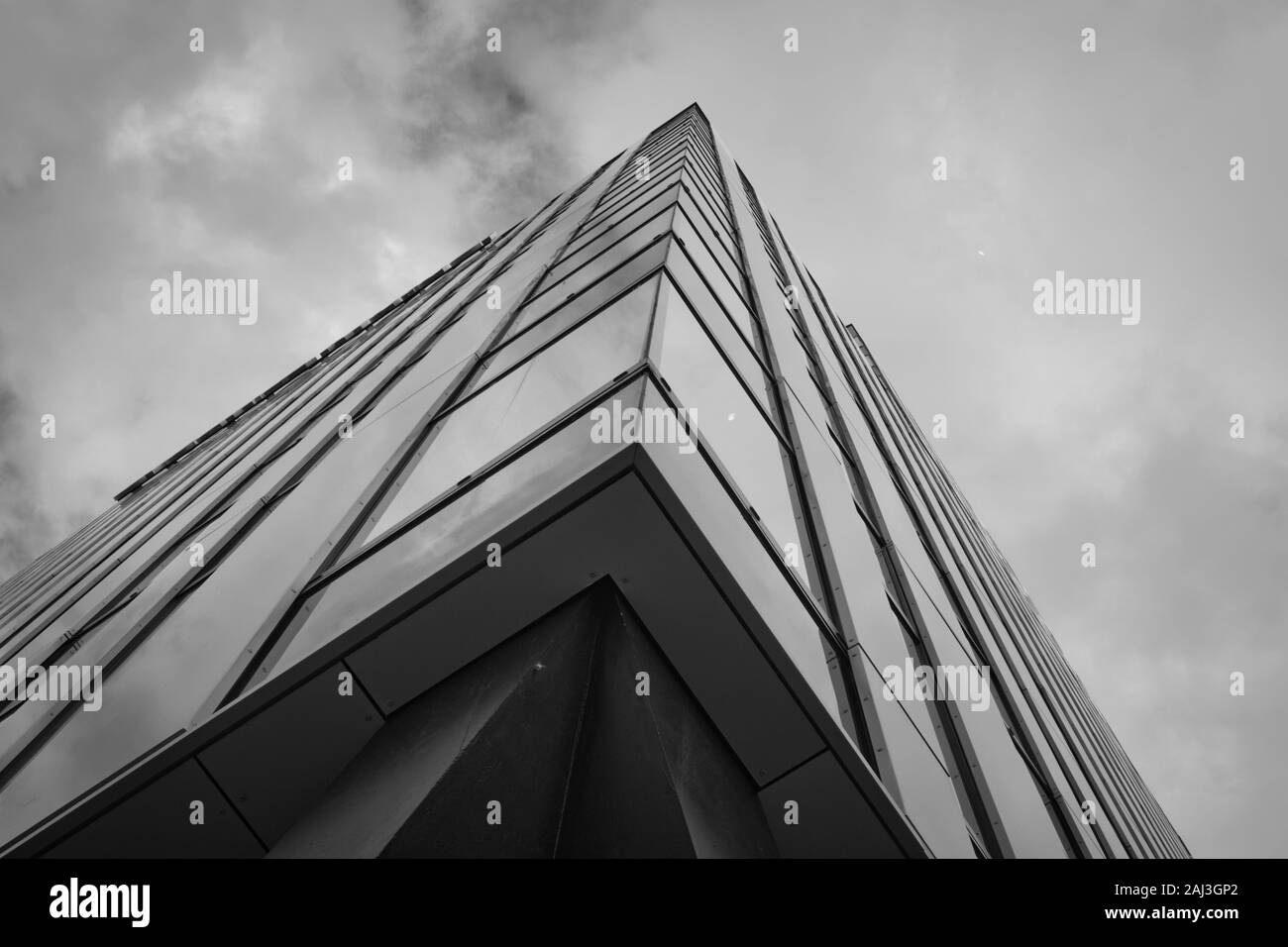 Buisiness-building reaching to the sky in grey Stock Photo