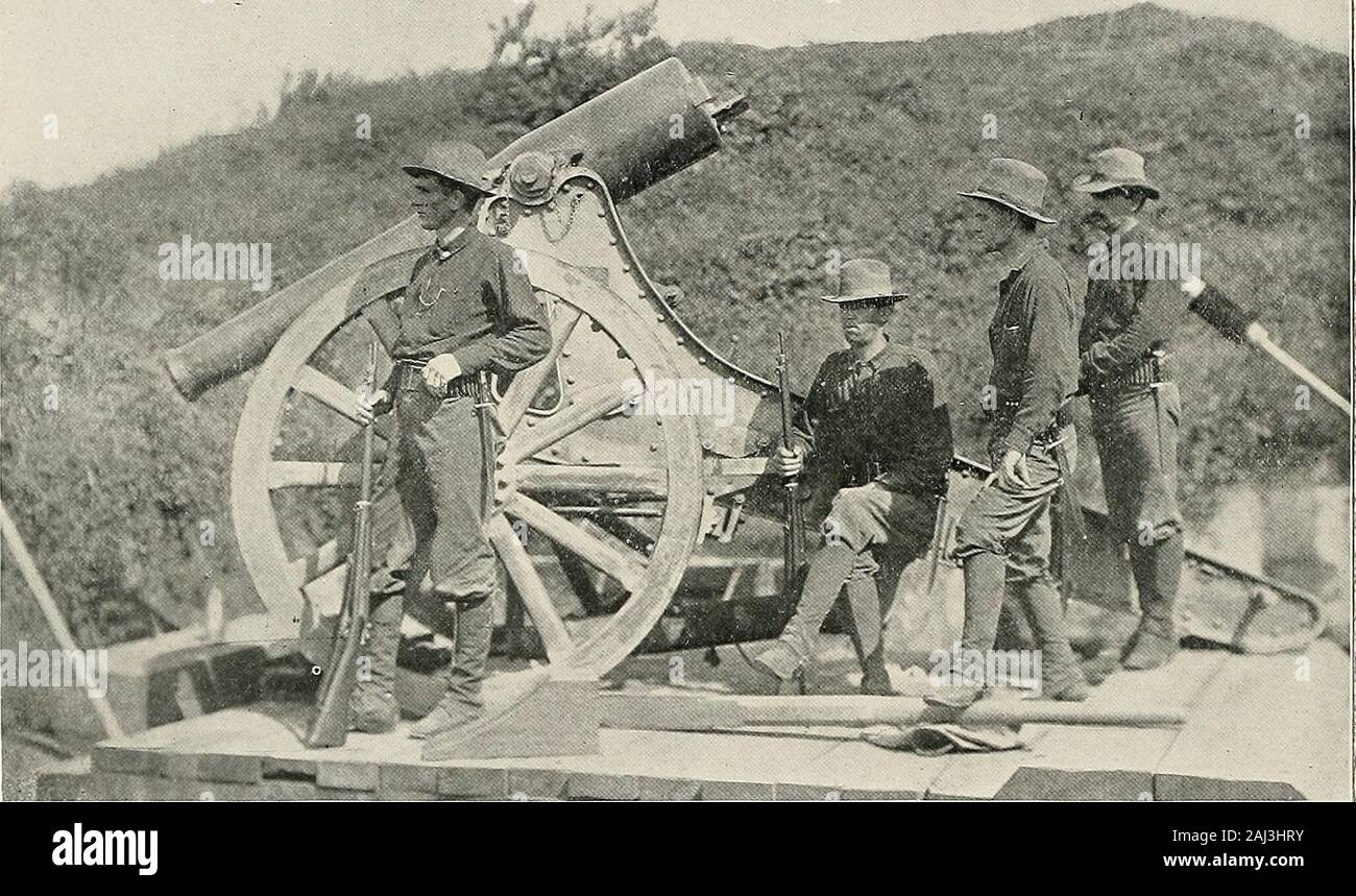 Fighting in the Philippines; authentic original photographs . House at trenches near beach occupied at opening of action as headquarters. Second Brigade, Second Division, EighthArmy Corps. (General F. V. Greene) Telegraph station of Signal Corps.. Old-fashioned siege gun. Stock Photo