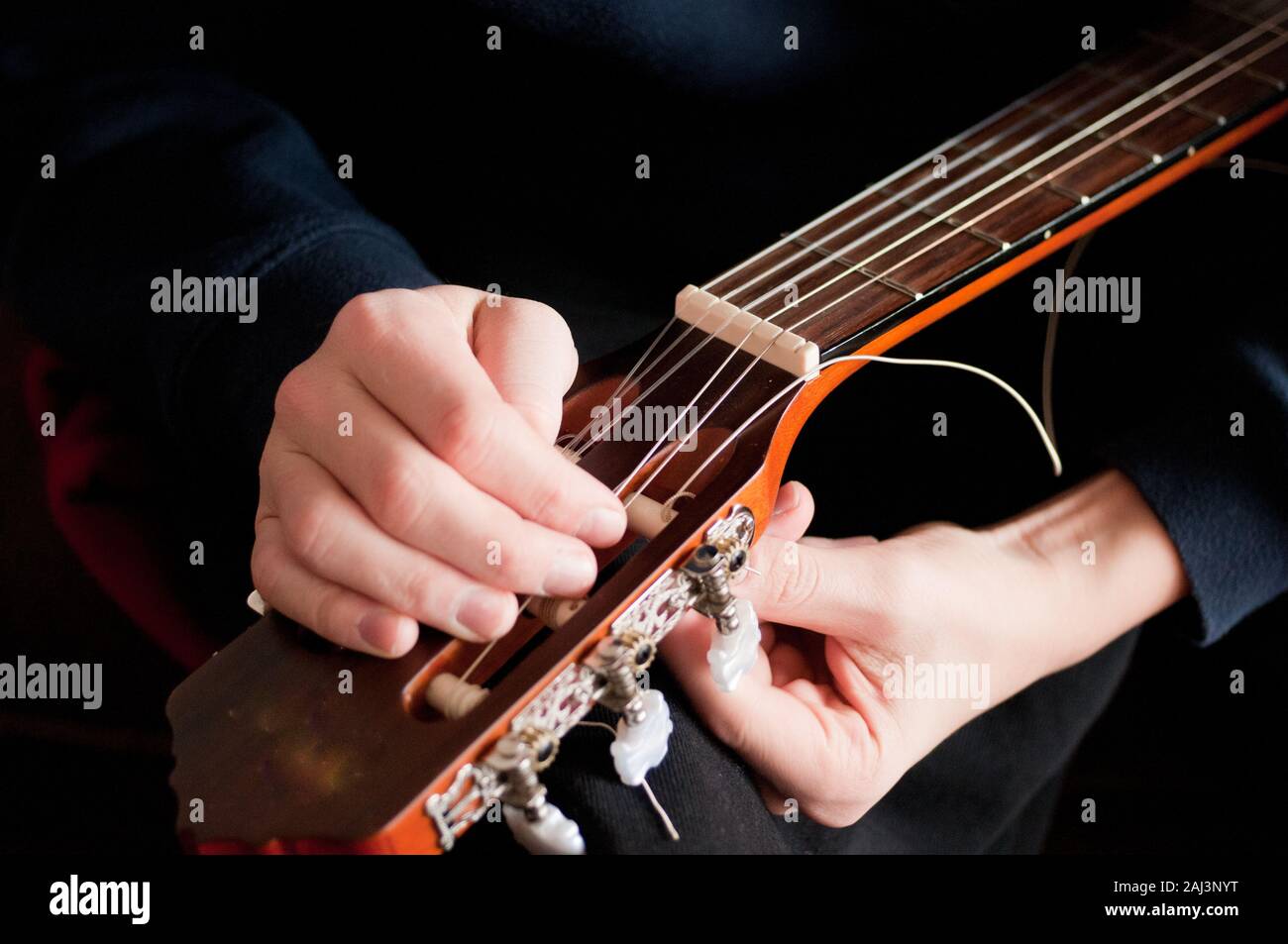 acoustic guitar stringing Stock Photo