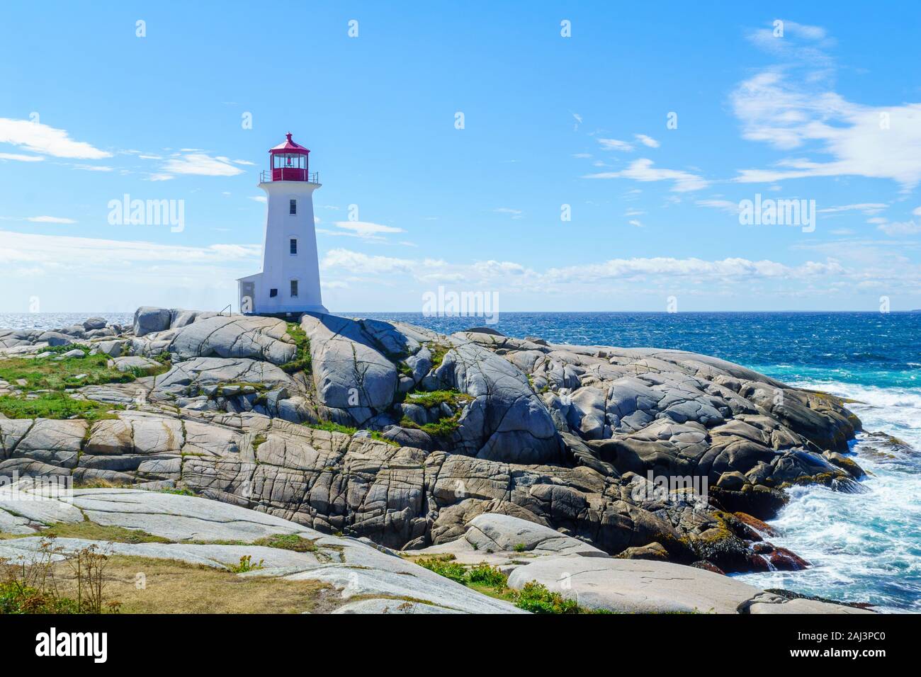 View of the lighthouse of the fishing village Peggys Cove, in Nova Scotia, Canada Stock Photo