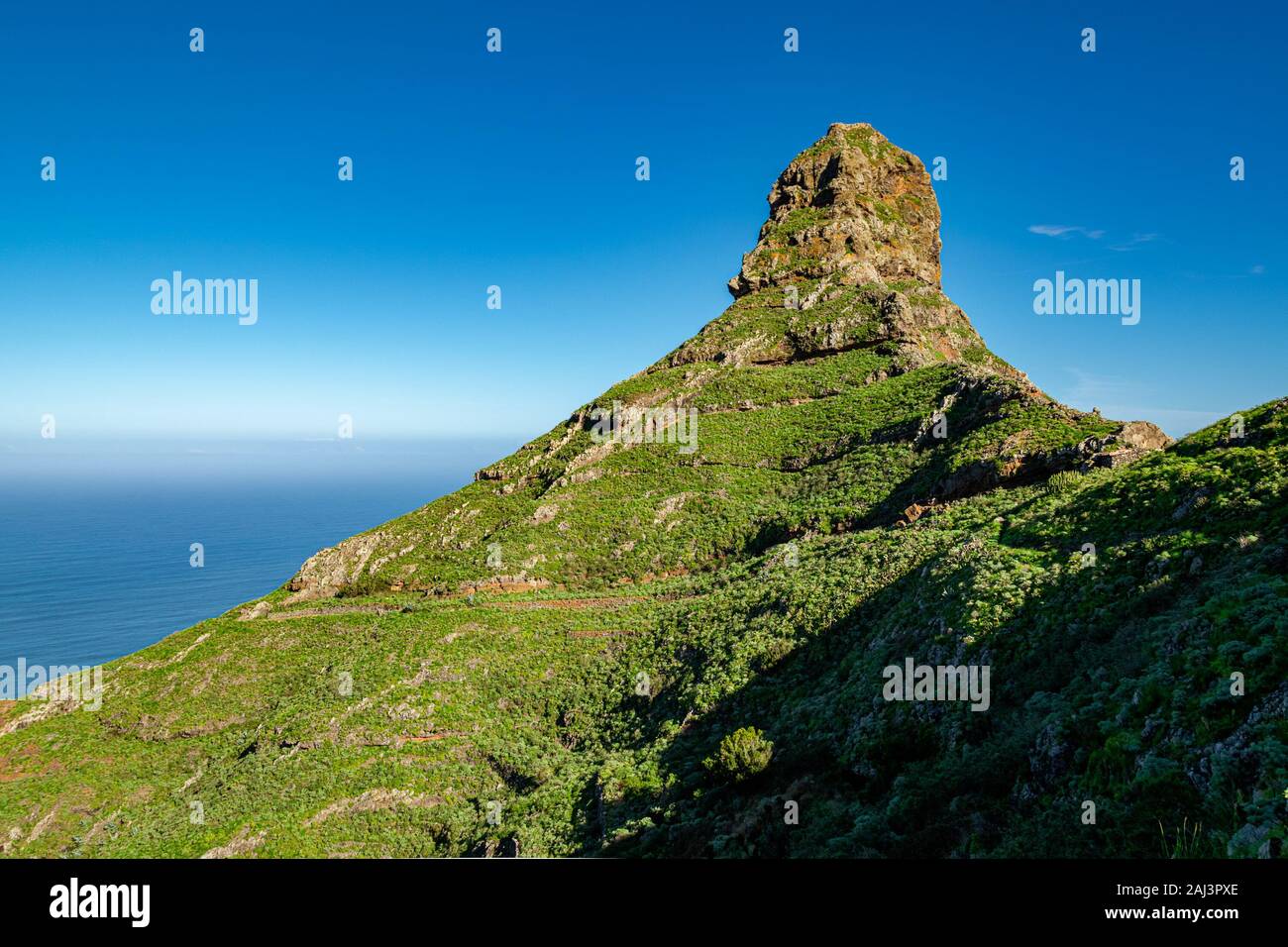 Roque de Taborno - one of the most iconic geological formations within the Macizo de Anaga mountain range, a Biosphere Reserve on Tenerife. Stock Photo