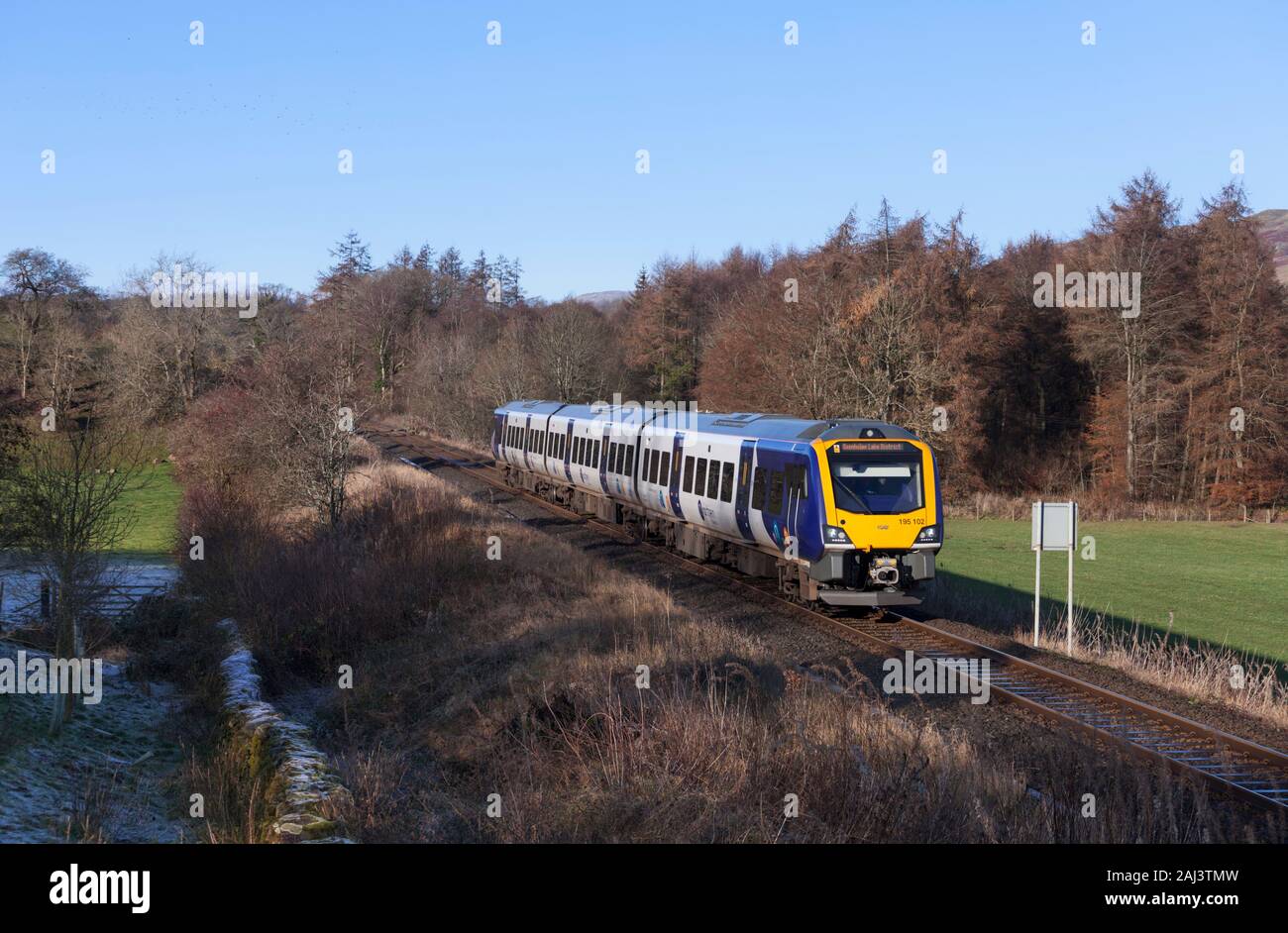 Arriva Northern rail CAF built class 195 train at  Burneside  on the single track Oxenholme to Windermere 'lakes line' branch line Stock Photo