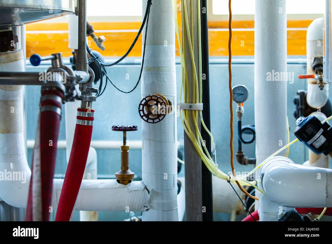 lot of different pipes and valves, brewery piping systems and