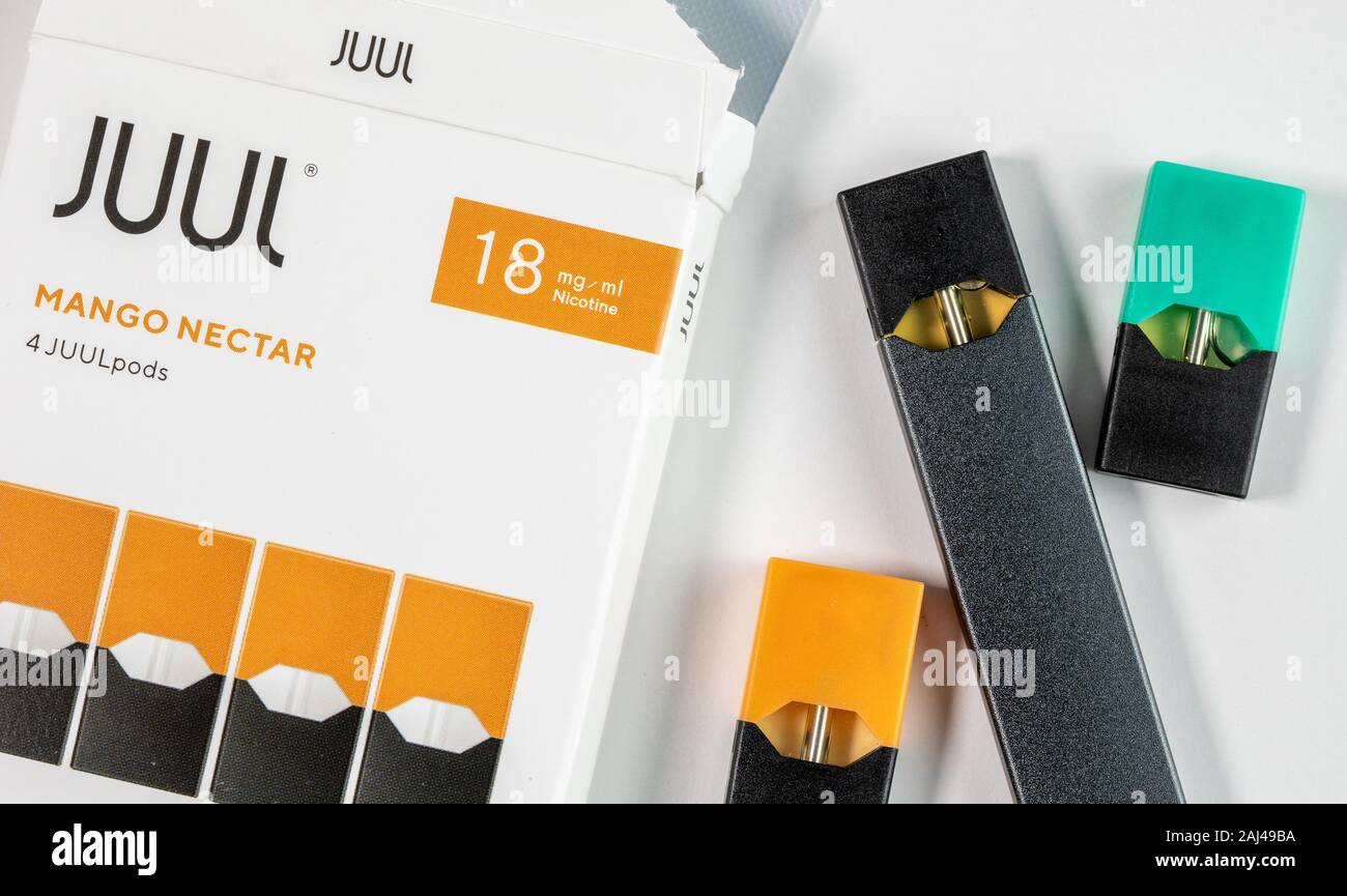Morgantown, WV - 2 January 2020: Juul mango nectar flavored nicotine vaping system banned in the USA Stock Photo