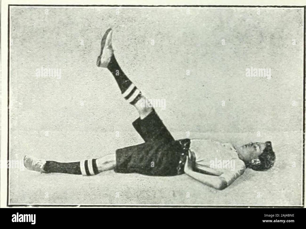 Syllabus of physical exercises for schools . ays AND downward. 4. Knee raising, leg stretching backward. (Hips firm.) 5. Arm swinging forward andsideways, with forwardlunge. (Arms forward andupward raise.) ^Alternate leg rasingA {Lying.Hips firm.)or. Trunk falling backward. {Kneeling, Arms bend.) 6. a. Trunk turning. (Left arm BEND. right hand NECKREST.) b. Trunk bending sideways.(Feet astride, arms up-ward stretch.) 7. a. Crosswise step. (Hands ON hips.)b. Skipping or jumping, or game. 8. Breathing. Arm turning out- ward AND inward. COMMANDS. c. Left (right) foot backward in lunge position—pl Stock Photo