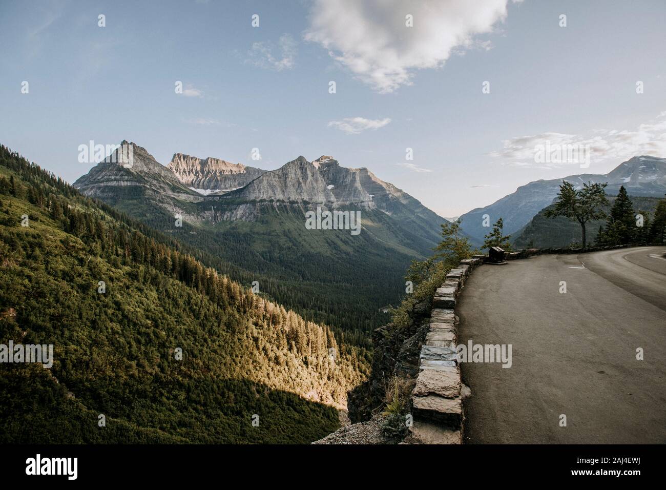 mountains, drop-off and sunset on going to the sun road, Montana Stock Photo