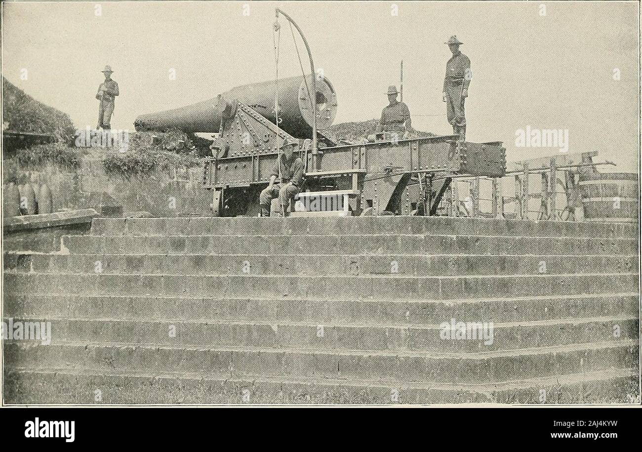 Fighting in the Philippines; authentic original photographs . Modern ten-inch gun and fortifications on Pasig Eiver, end of Luneta. Stock Photo