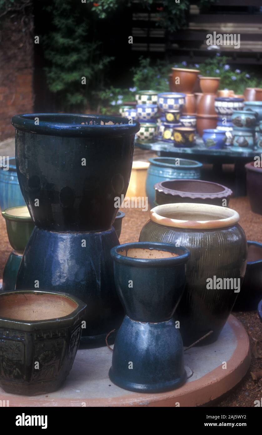 ASSORTED GARDEN POTS FOR SALE AT A NURSERY IN SUBURBAN DURAL, NEW SOUTH