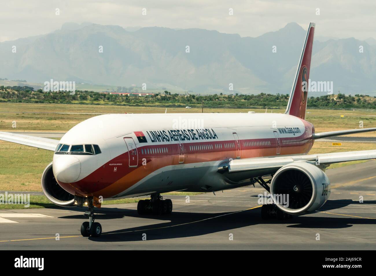 TAAG Angola airlines commercial passenger jet plane close up on arrival