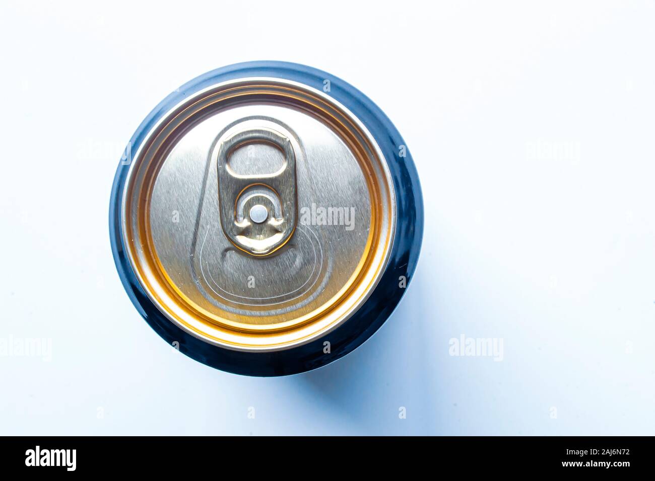 Top view of an golden isolated recyclable aluminium can of a carbonated drink with a soft shadow Stock Photo