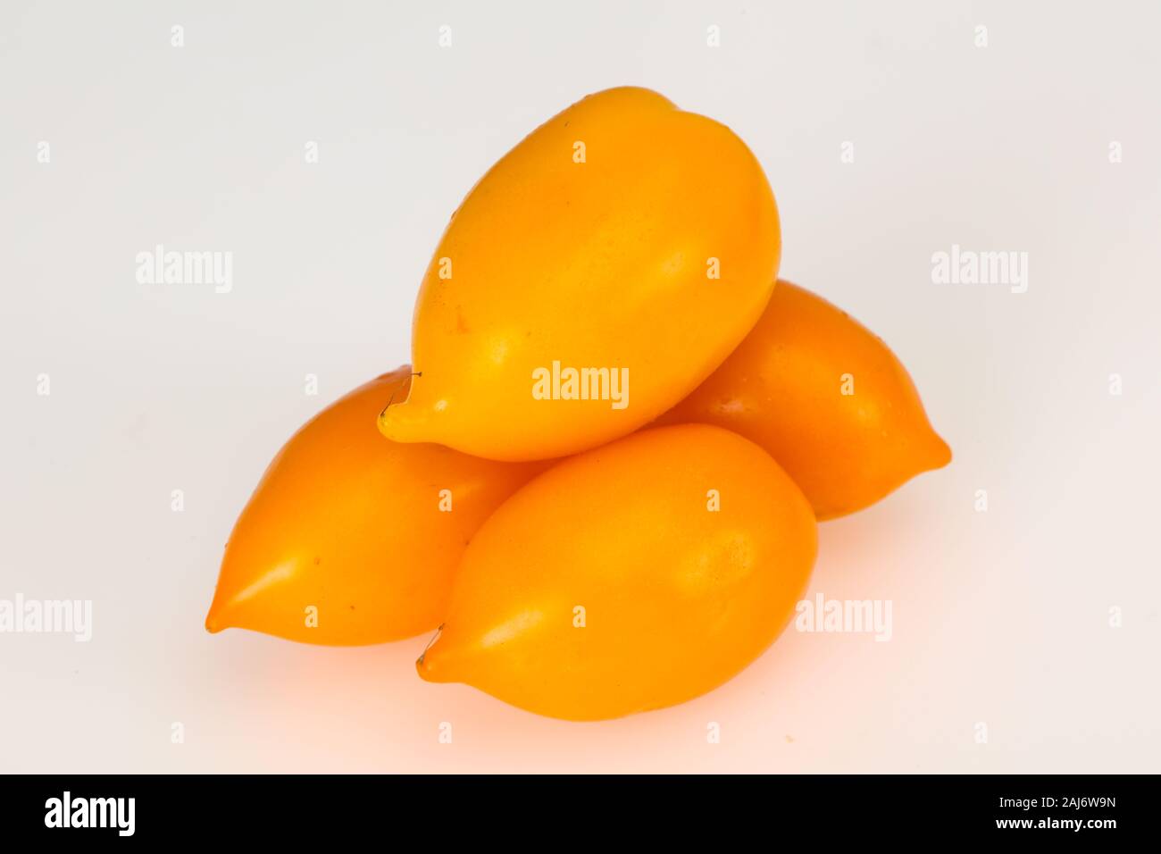 Ripe Yellow tomato isolated on white background Stock Photo - Alamy