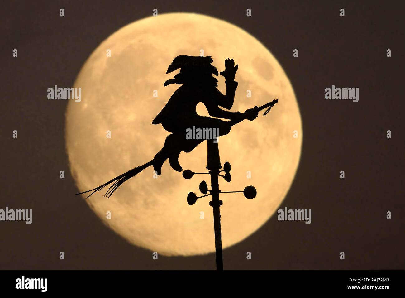 Witch As Weather Vane Silhouette In Front Of Full Mooen Witch Sabbath witch-as-weather-vane-silhouette-in-front-of-full-mooen-witch-sabbath