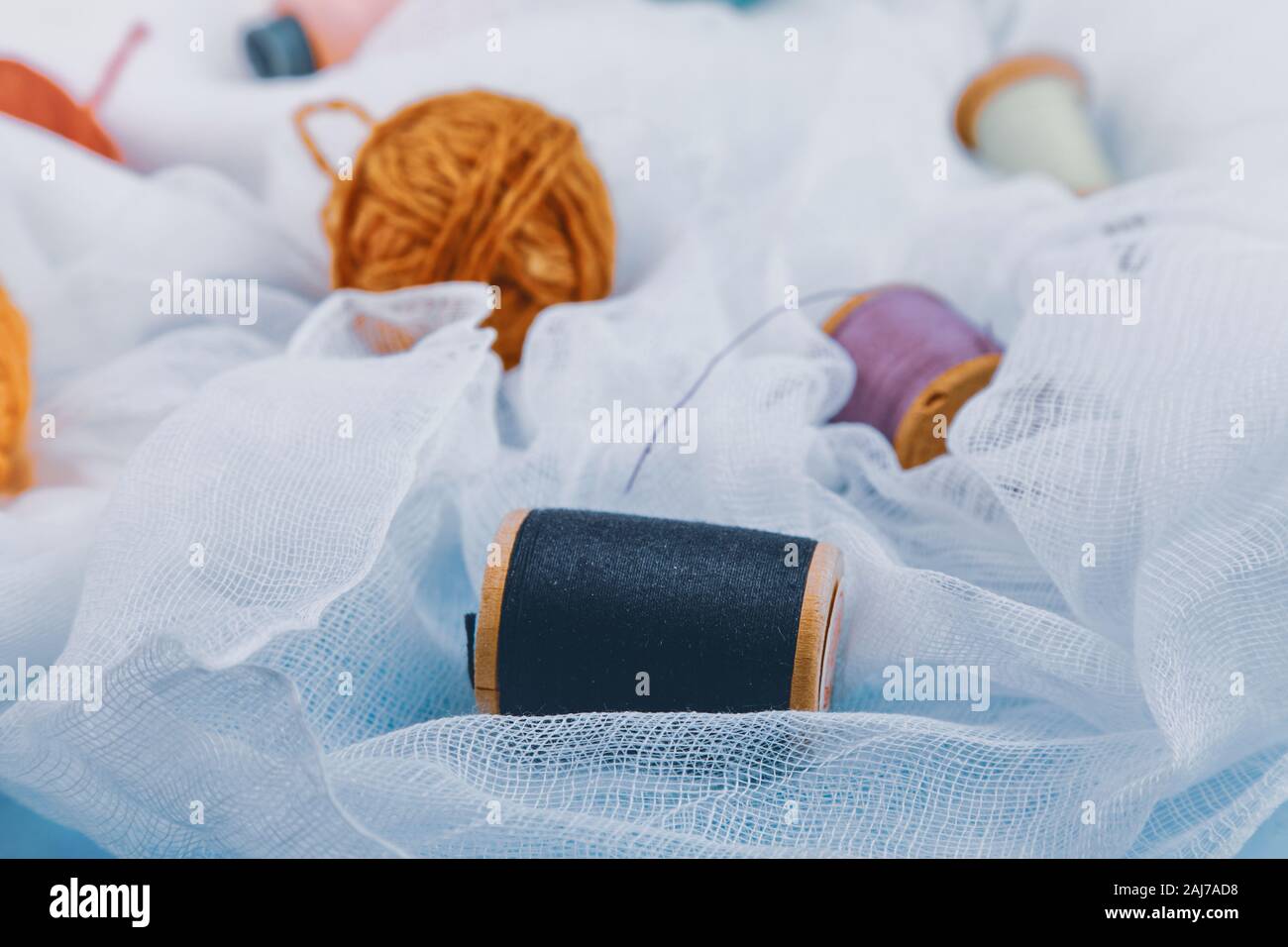multi-colored threads for sewing and knitting Stock Photo