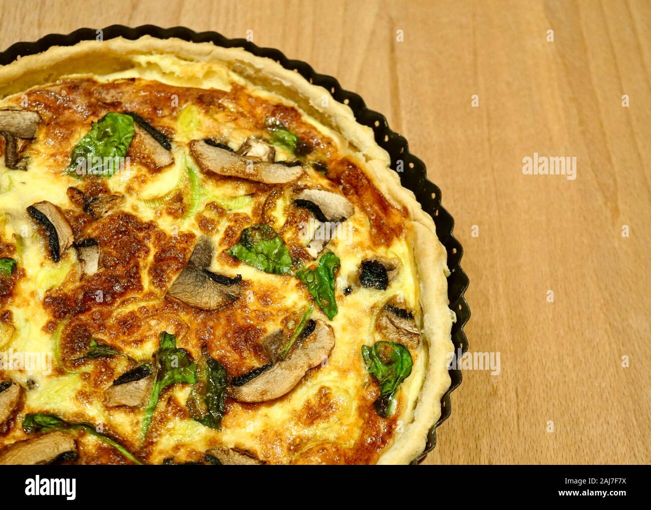 Homemade mushroom, leek and spinach flan Stock Photo Alamy