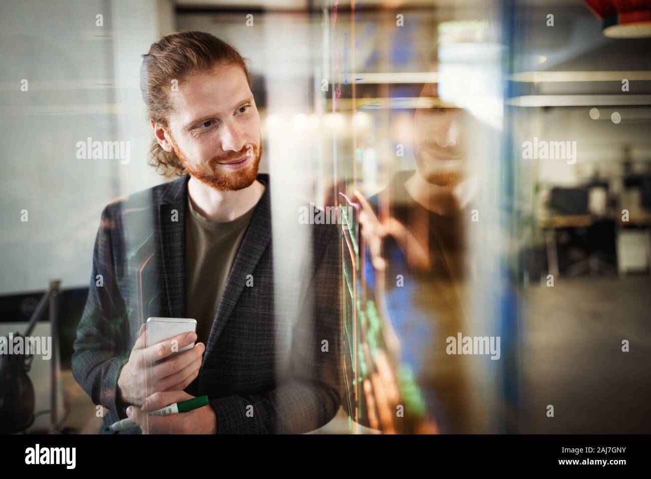 Programmer working in a software developing company Stock Photo - Alamy