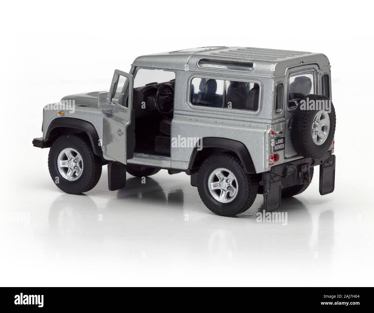 Toy Land Rover Defender on a white background Stock Photo