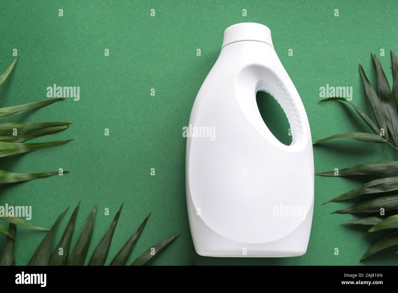 Plastic bottles and green leaves on green background. Recycling pack, eco  bio liquid detergent, cleaning agent, antibacterial gel with natural plant e  Stock Photo - Alamy